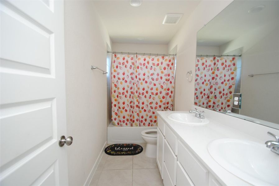 Furnished interior view inside a new home in Mason Woods, Cypress (Image 12).