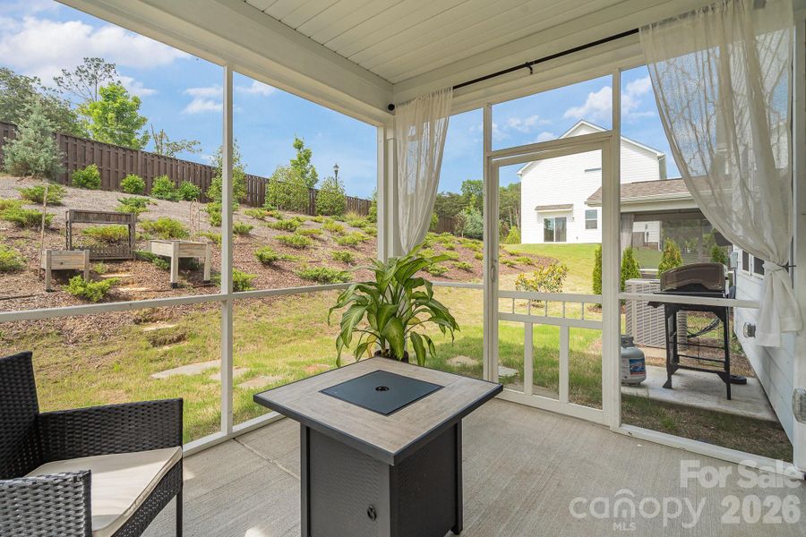 Exterior details and patio area of a home in Village at North Reach, Charlotte (Image 4).