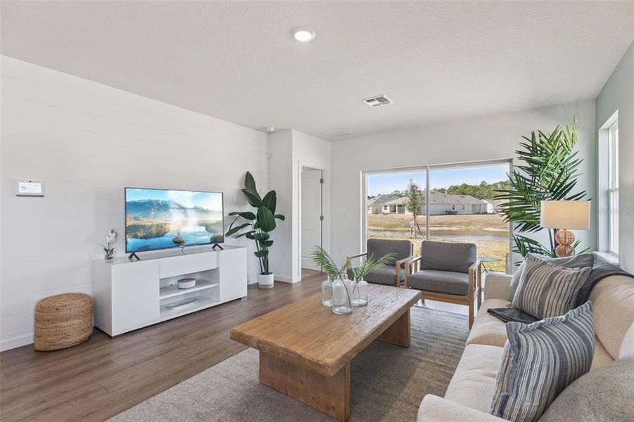 Furnished interior view inside a new home in Halifax Plantation Villas, Ormond Beach (Image 9).
