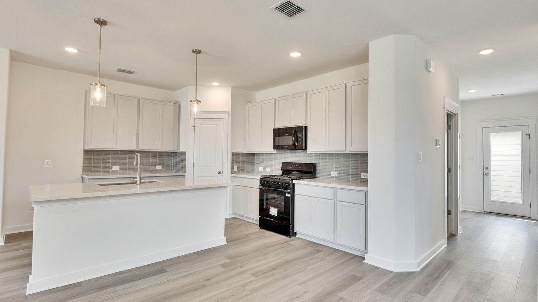 Furnished interior view inside a new home in Creeks Crossing, Elgin (Image 5).