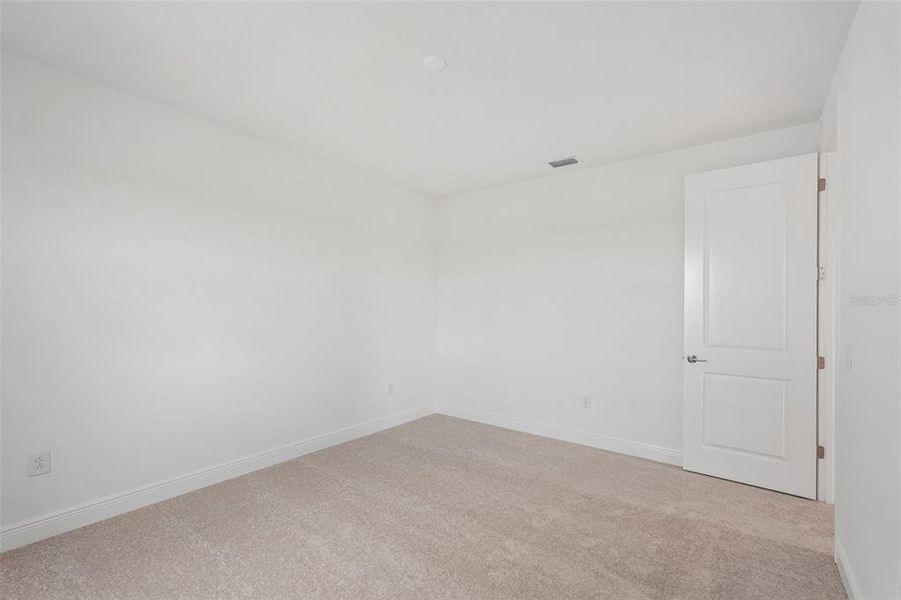 Spacious, unfurnished interior of a new home in Hawkstone, Sarasota (Image 36).
