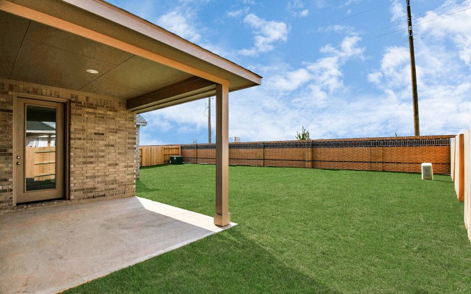 Exterior details and patio area of a home in Elyson, Katy (Image 2).
