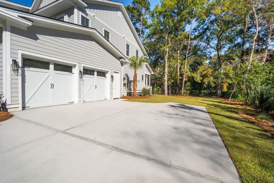 Exterior details and patio area of a home in , Johns Island (Image 44).