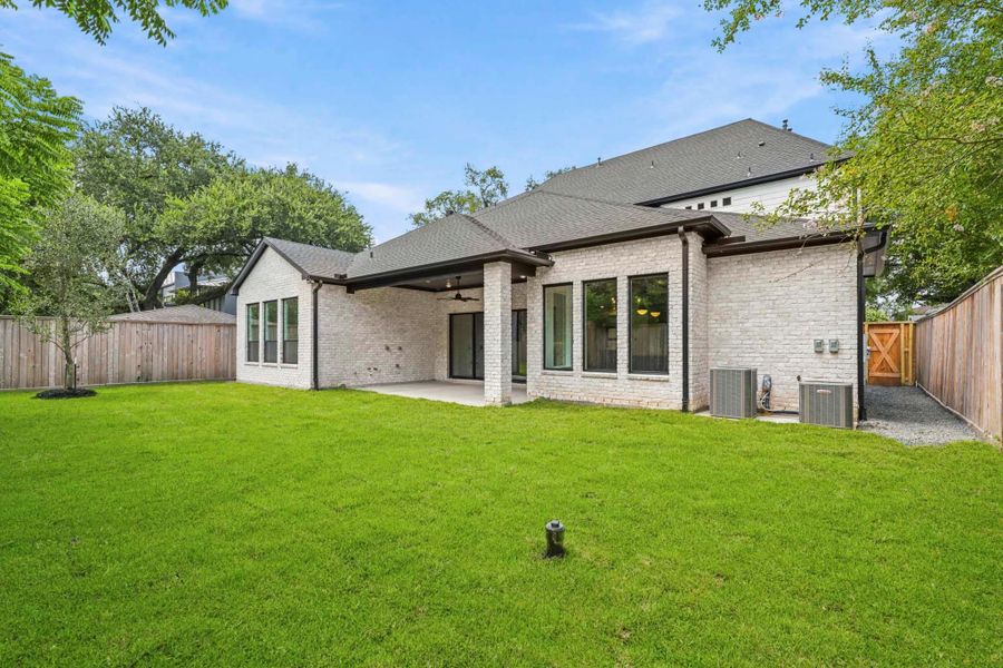 Exterior details and patio area of a home in , Houston (Image 2). Exterior details and patio area of a home in , Houston (Image 2).