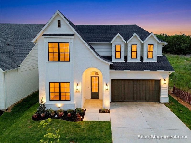 Front exterior of a new home in , Aledo, TX, highlighting curb appeal (Image 1). Front exterior of a new home in , Aledo, TX, highlighting curb appeal (Image 1).