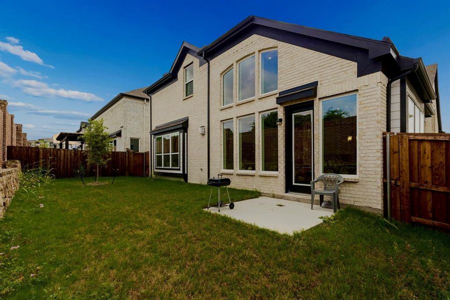 Brick exterior with dark trim accents