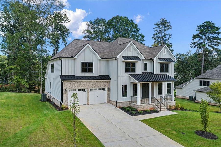 Front exterior of a new home in , Atlanta, GA, highlighting curb appeal (Image 2).
