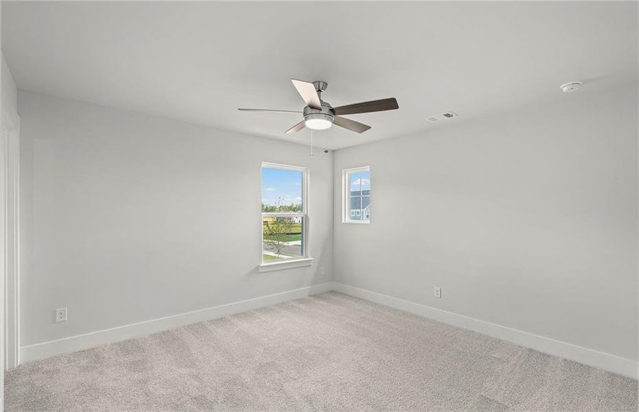 Spacious, unfurnished interior of a new home in Creekside at Skelton, Jefferson (Image 23).