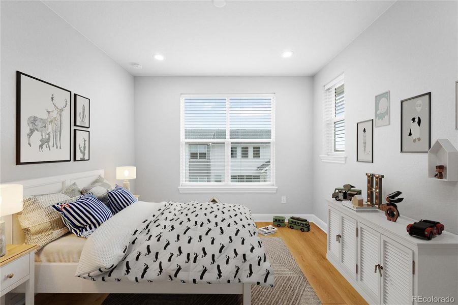 One of three additional upper level bedrooms