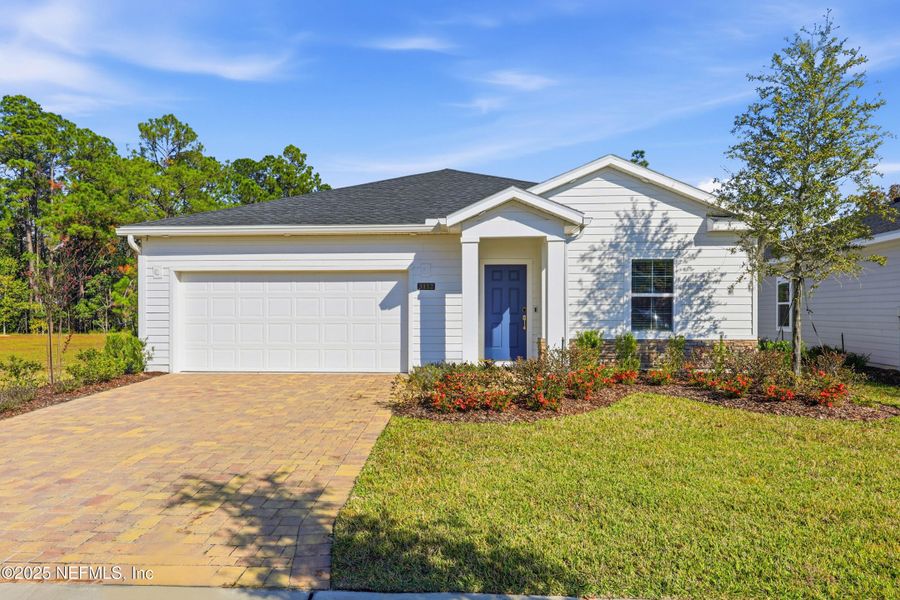 Front exterior of a new home in , Green Cove Springs, FL, highlighting curb appeal (Image 1). Front exterior of a new home in , Green Cove Springs, FL, highlighting curb appeal (Image 1).