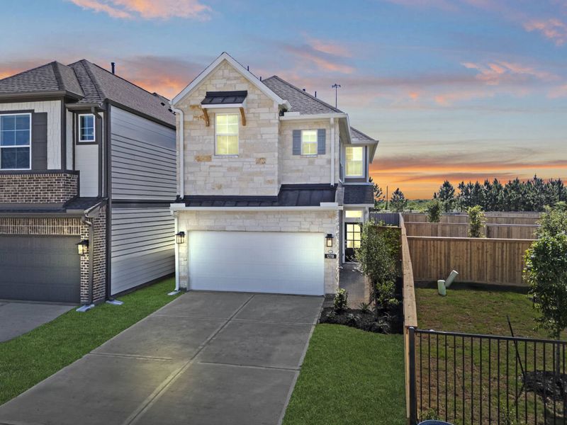 Front exterior of a new home in Bridgeland, Cypress, TX, highlighting curb appeal (Image 22).