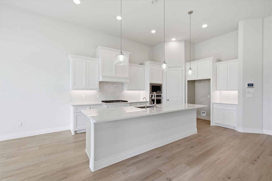 Furnished interior view inside a new home in Bridgeland 50′, Cypress (Image 6).