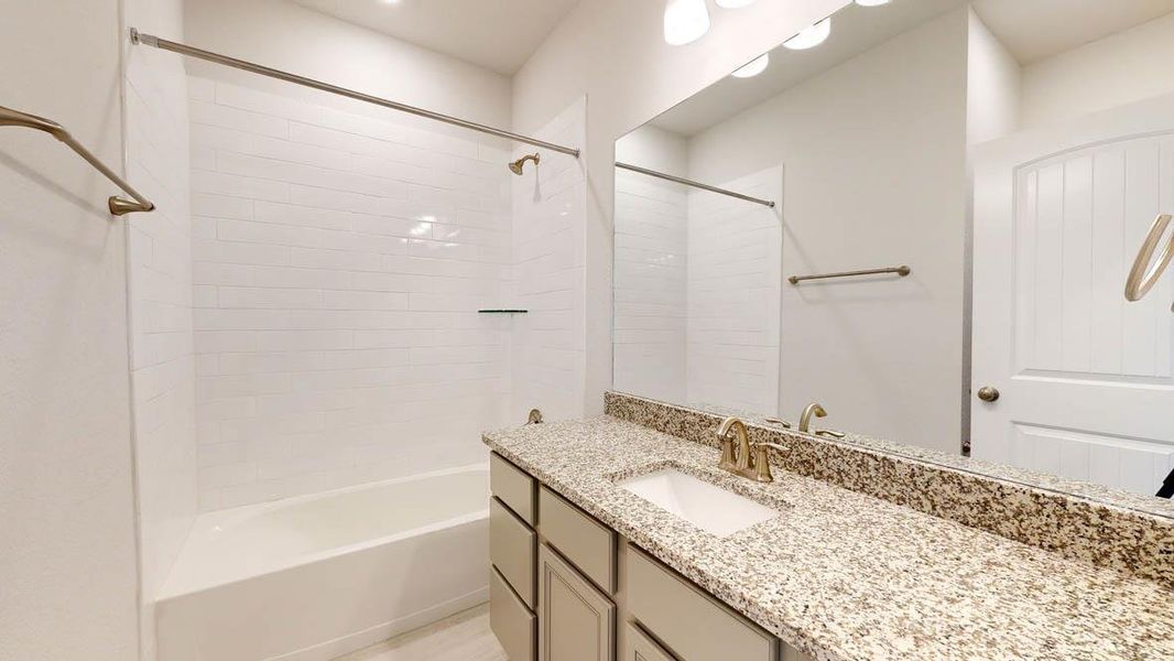 Full bathroom with vanity and  shower combination