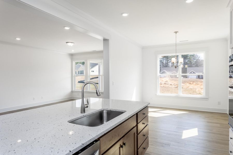 Furnished interior view inside a new home in The Enclave at Hidden Lake - 55+ Community, Youngsville (Image 11).