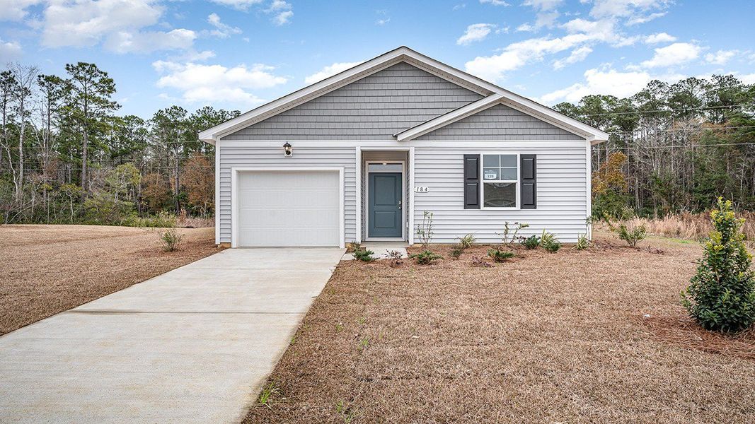 Representative exterior photo of a completed home built from the HELENA by D.R. Horton in Lochaven, Conway, SC (Image 1).