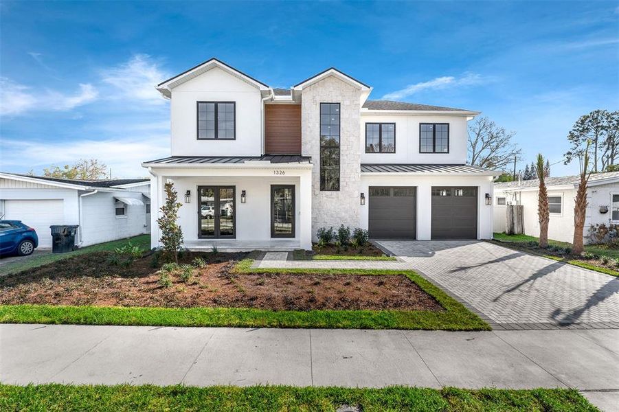 Front exterior of a new home in College Park, Orlando, FL, highlighting curb appeal (Image 2).