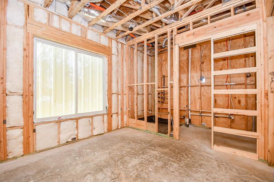 1st floor bedroom with large window.  24x48 tile to be installed.