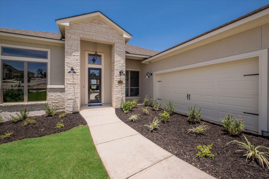 Exterior details and patio area of a home in Johnson Ranch, Bulverde (Image 3).
