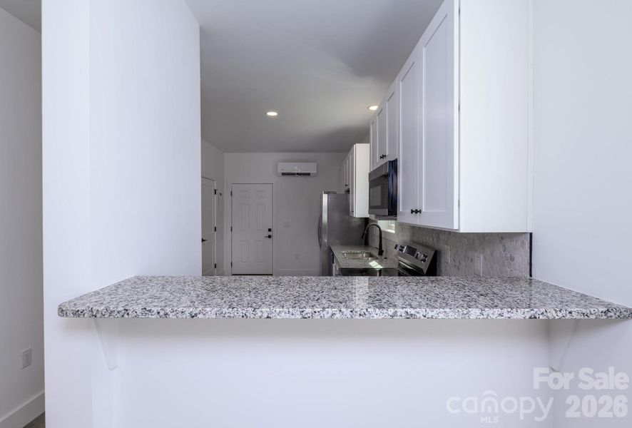 Furnished interior view inside a new home in , Candler (Image 6).