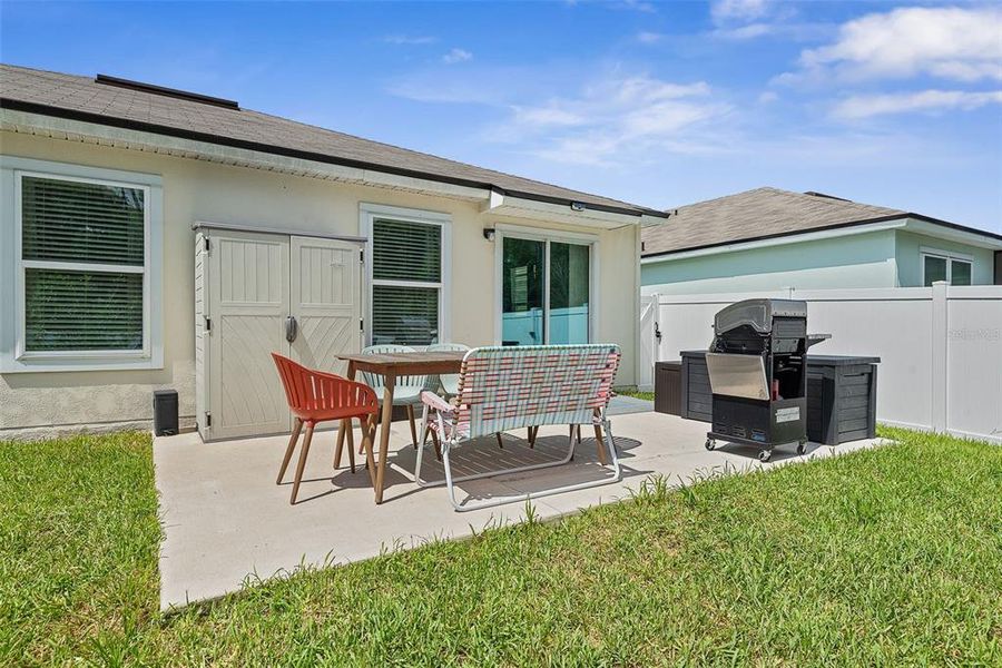 Exterior details and patio area of a home in Sawmill Branch, Palm Coast (Image 29).
