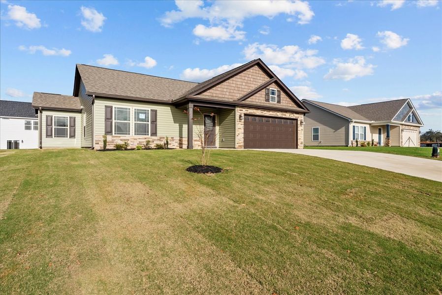 Representative exterior photo of a completed home built from the Rozlynn by Enchanted Homes in Guadalupe Heights, Seguin, TX (Image 26).