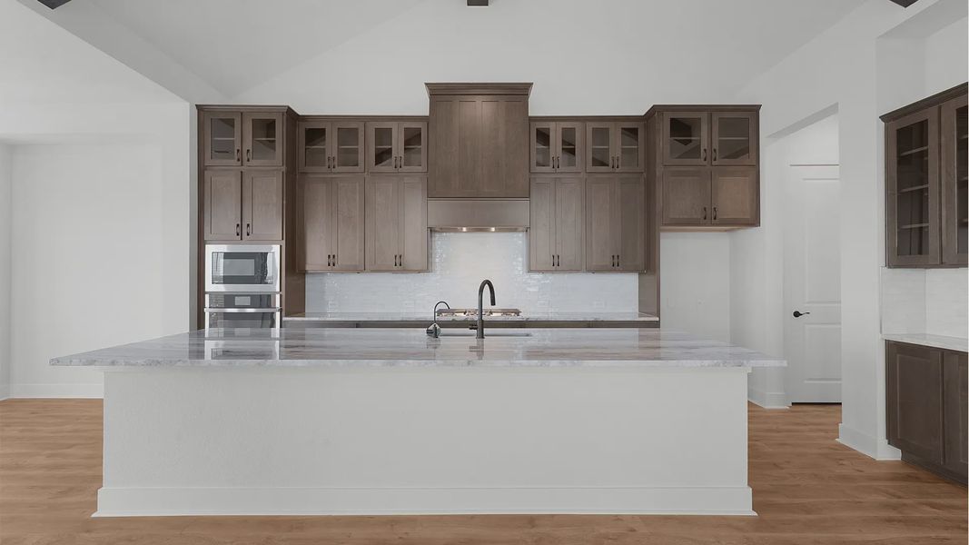 Representative furnished interior of a home built from the Drios by Chesmar Homes in Berry Creek Highlands, Georgetown (Image 6).