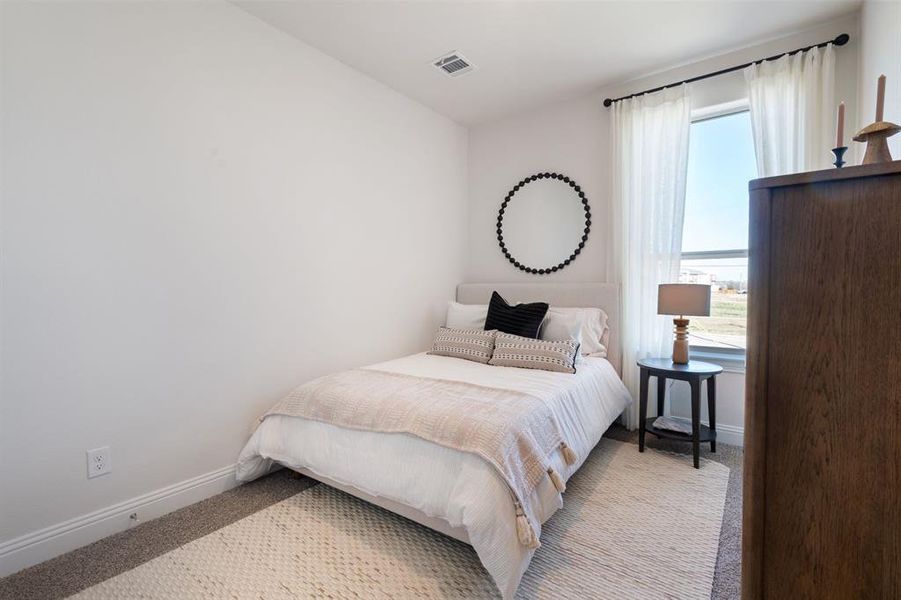 Furnished interior view inside a new home in Waterbend, Euless (Image 10).