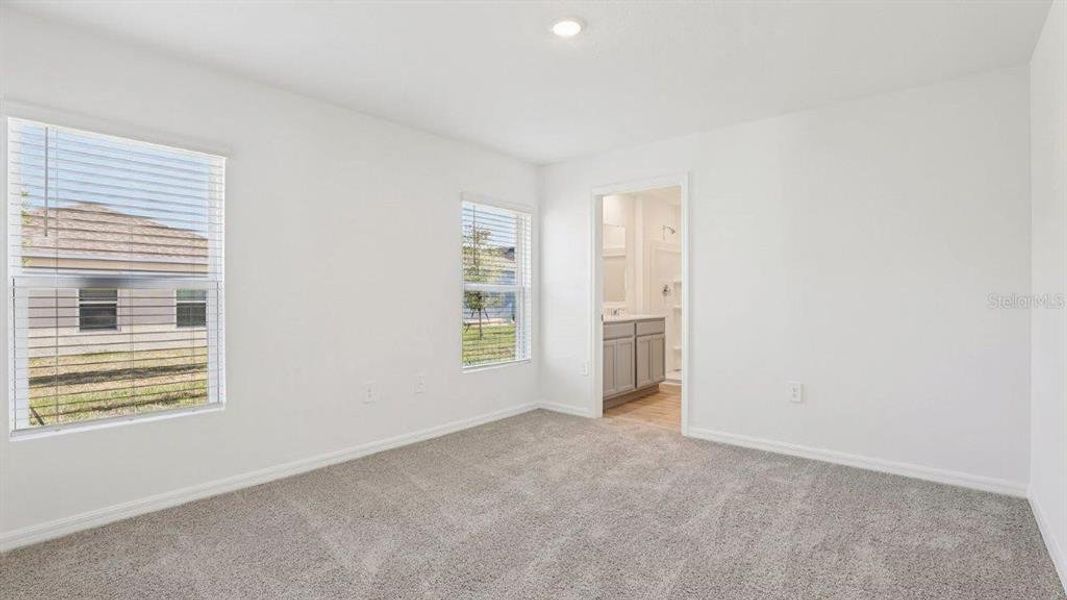 Spacious, unfurnished interior of a new home in Villamar, Winter Haven (Image 24).