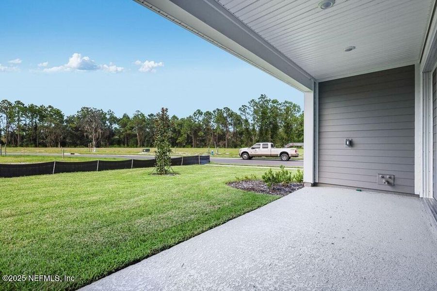 Exterior details and patio area of a home in Colbert Landings, Palm Coast (Image 22).