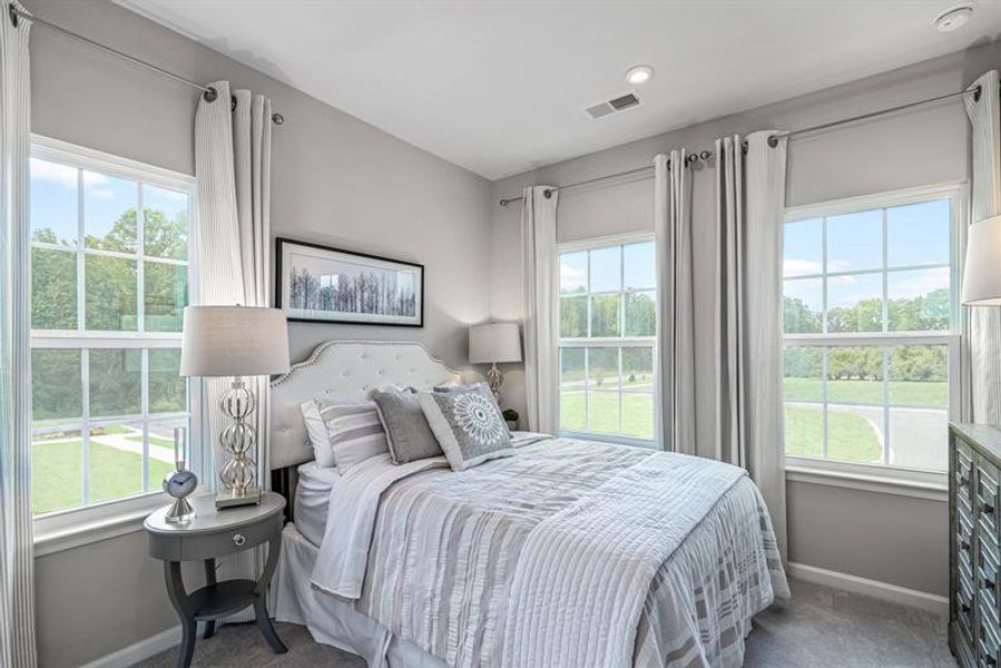 Furnished interior view inside a new home in The Mills at Rocky River Townhomes, Concord (Image 14). Furnished interior view inside a new home in The Mills at Rocky River Townhomes, Concord (Image 14).