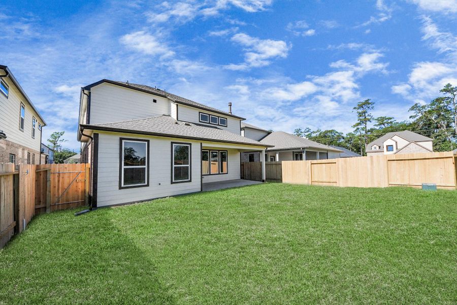 Explore the expansive backyard with its inviting covered patio—a perfect blend of space for the kids to play and adults to unwind. Ideal for creating your outdoor oasis, this backyard accommodates patio furniture, a BBQ pit, and endless possibilities for leisure and entertainment.