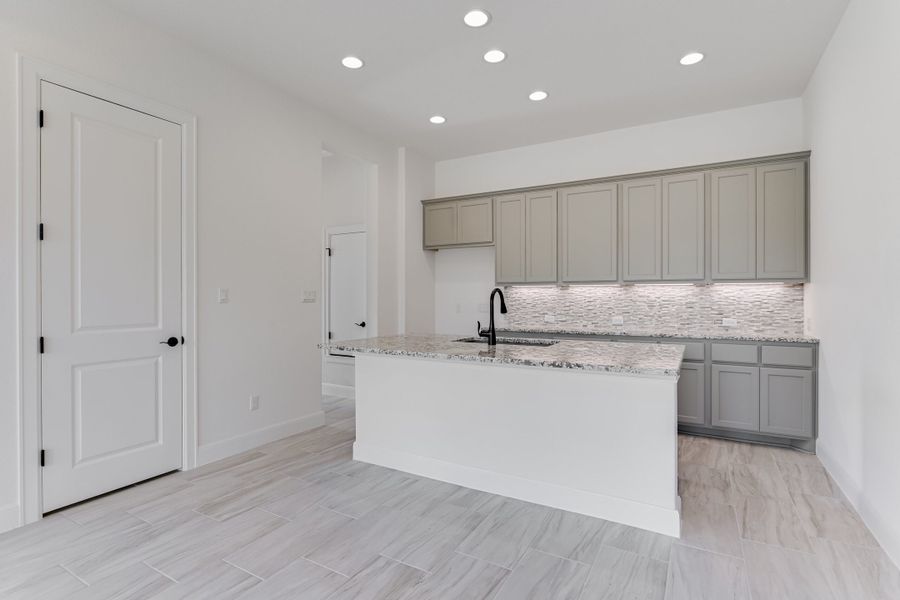 Representative furnished interior of a home built from the Casita by Giddens Homes in Whispering Wind, Bertram (Image 18).