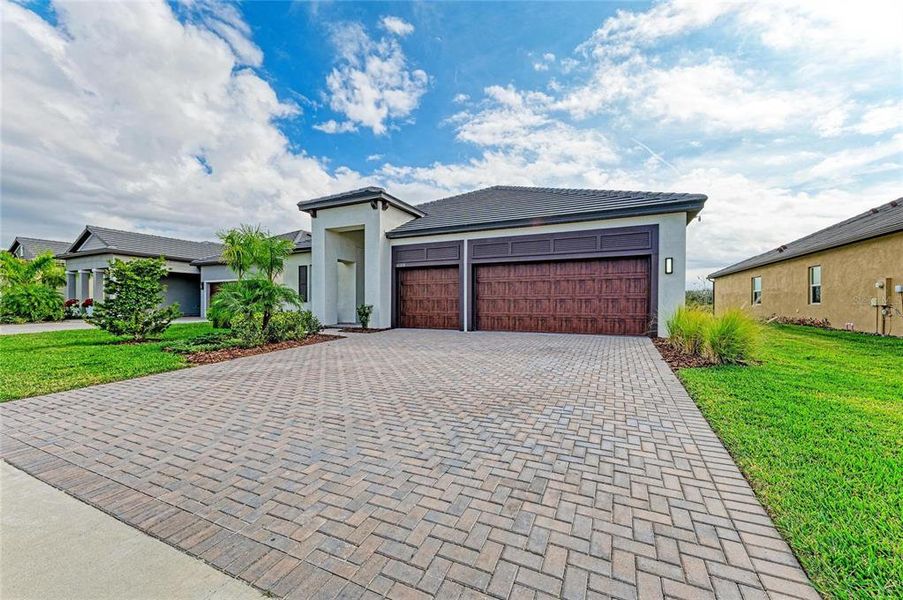 Front exterior of a new home in , Parrish, FL, highlighting curb appeal (Image 31).