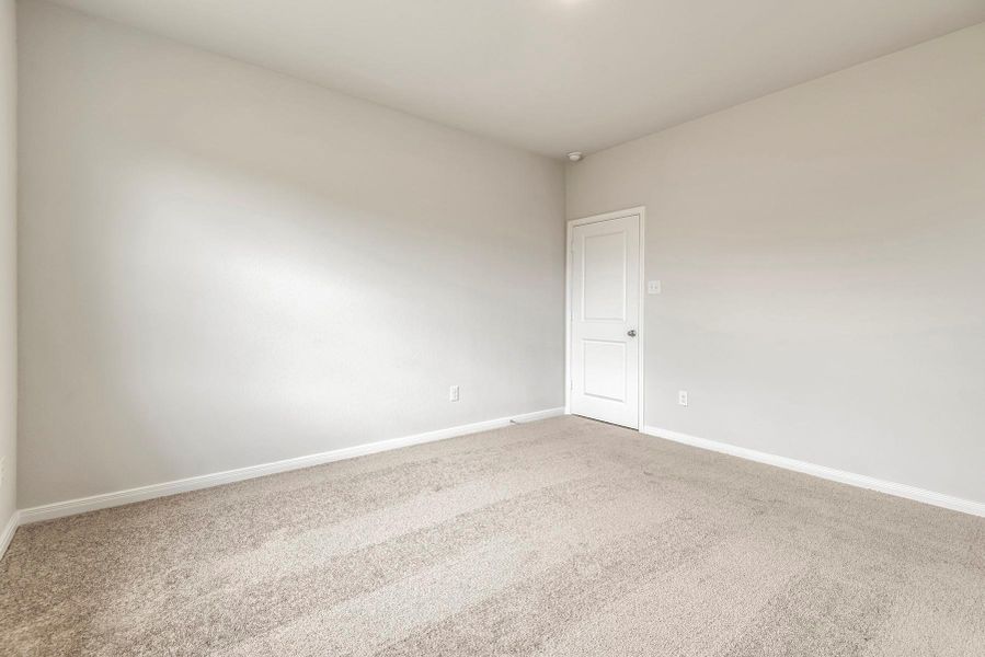 Spacious, unfurnished interior of a new home in Freeman Ranch, Katy (Image 8).