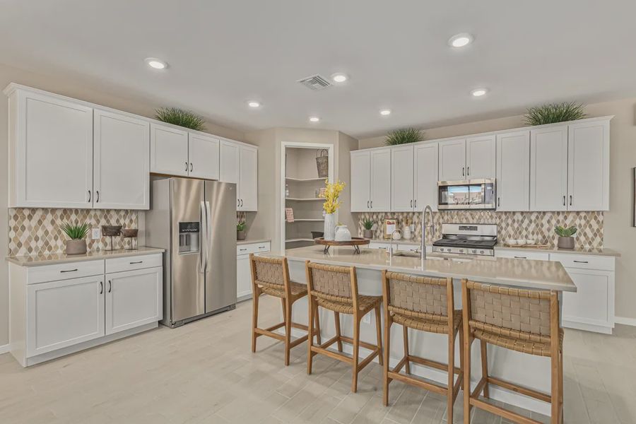 Representative furnished interior of a home built from the 2257 by Elliott Homes in Acacia at Santana, Yuma (Image 17).