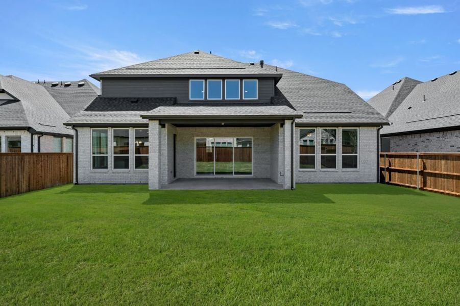 Exterior details and patio area of a home in Cambridge Crossing, Celina (Image 28). Exterior details and patio area of a home in Cambridge Crossing, Celina (Image 28).