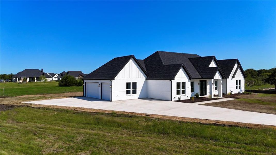 Front exterior of a new home in , Royse City, TX, highlighting curb appeal (Image 18). Front exterior of a new home in , Royse City, TX, highlighting curb appeal (Image 18).