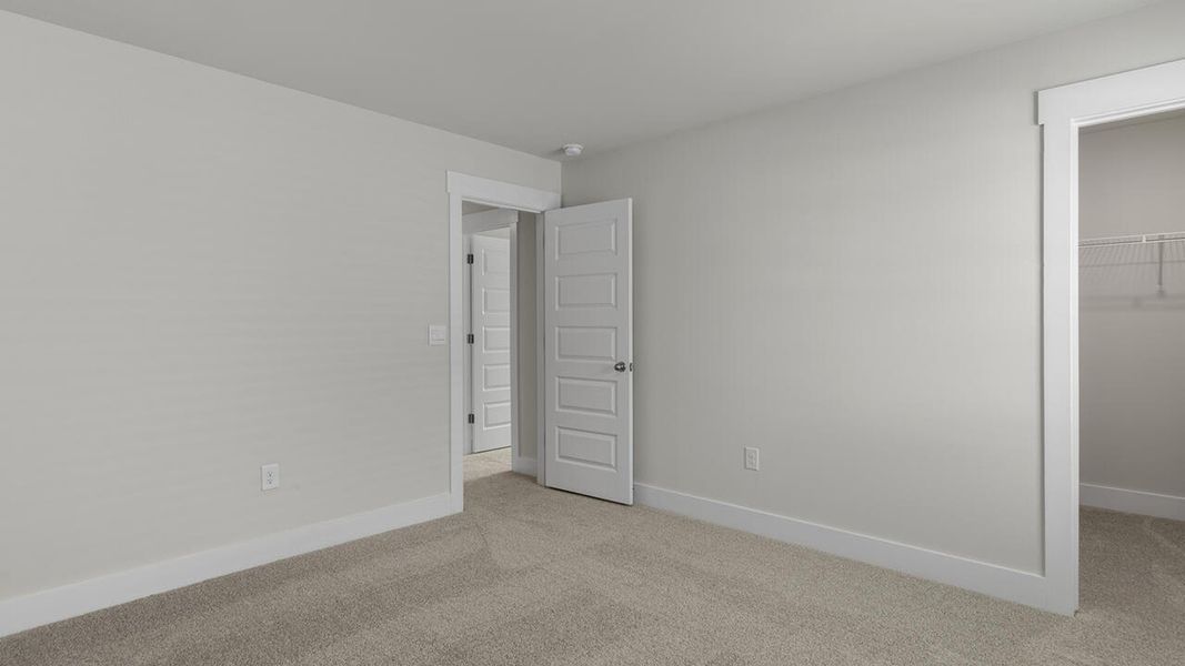Spacious, unfurnished interior of a new home in Surfside Landing, Hubert (Image 35).