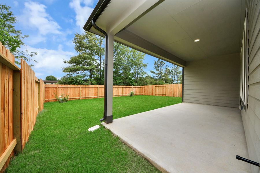 Experience outdoor living at its finest on this expansive covered patio, thoughtfully designed for BBQs and delightful outdoor dining. Experience outdoor living at its finest on this expansive covered patio, thoughtfully designed for BBQs and delightful outdoor dining.