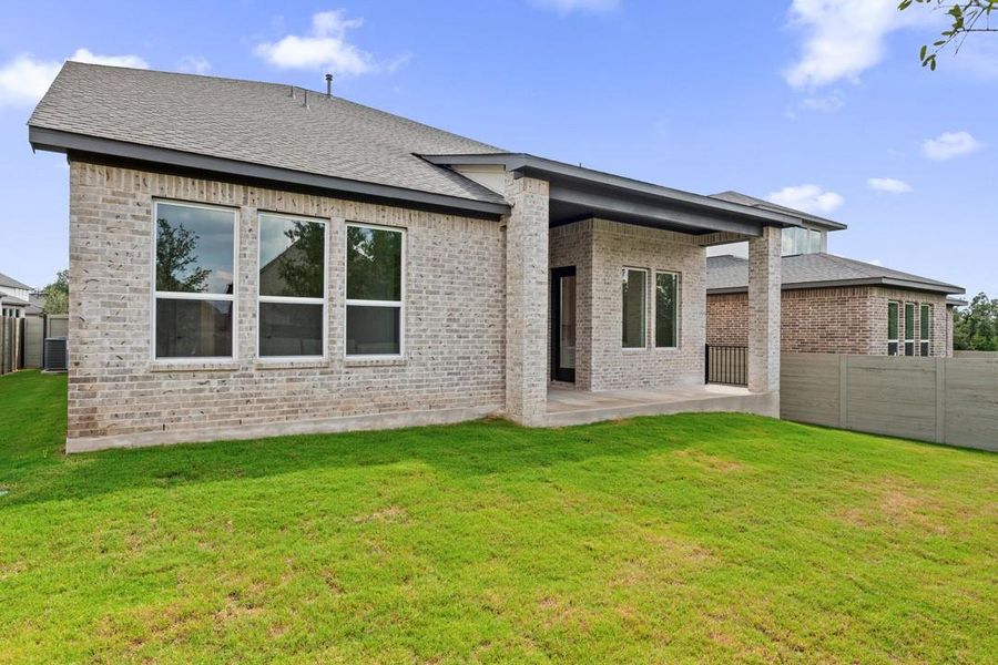 Exterior details and patio area of a home in Wolf Ranch, Georgetown (Image 3).