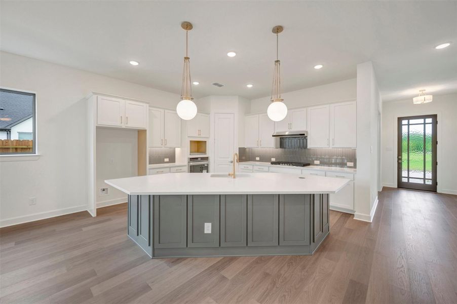 Furnished interior view inside a new home in Riceland - Enclave Row Collection, Mont Belvieu (Image 5).