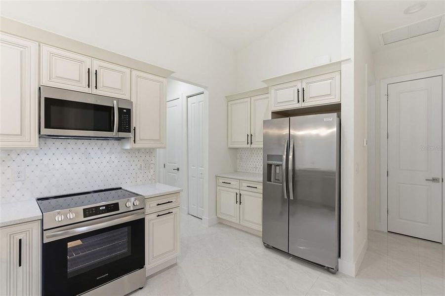 Furnished interior view inside a new home in , Port Charlotte (Image 7).