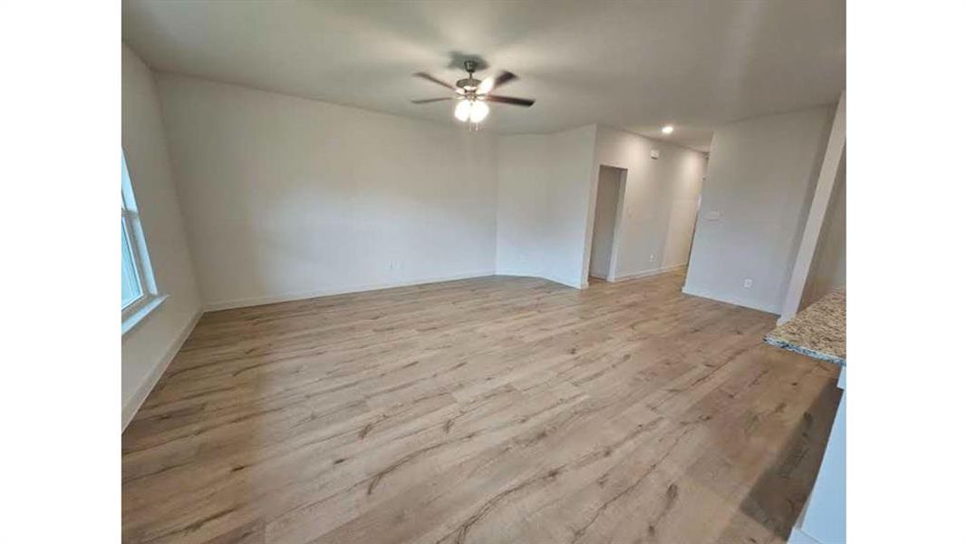 Spacious, unfurnished interior of a new home in Patriot Estates, Venus (Image 17).
