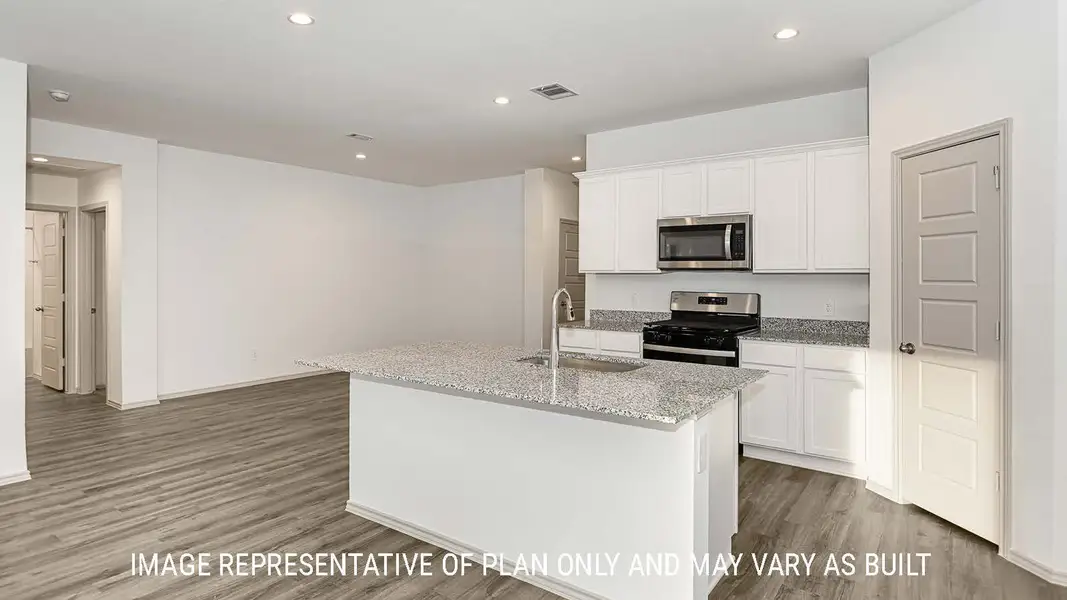 Representative furnished interior of a home built from the Lakeway by D.R. Horton in Highland Village, Nome (Image 4).