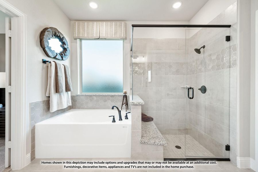 Master bathroom with soaking tub, glass-enclosed tile shower, and hexagon tile accents