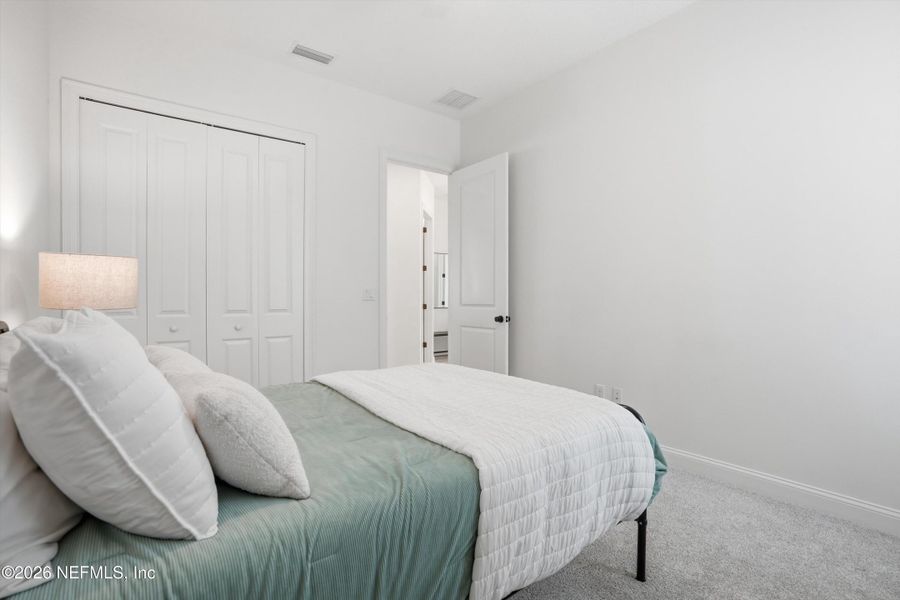 Furnished interior view inside a new home in Palm Crest at Seabrook, Ponte Vedra (Image 13).