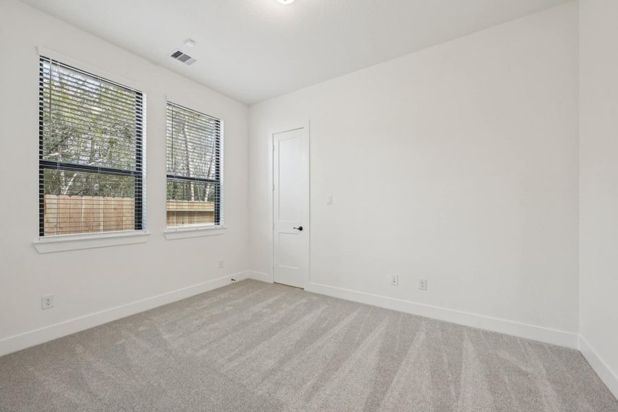 Representative unfurnished interior of a home built from the Summerton – 50′ Lot by Chesmar Homes in Lakes of Cane Island, Katy (Image 13).