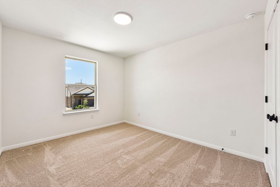 Spacious, unfurnished interior of a new home in Crosswinds, Kyle (Image 20).
