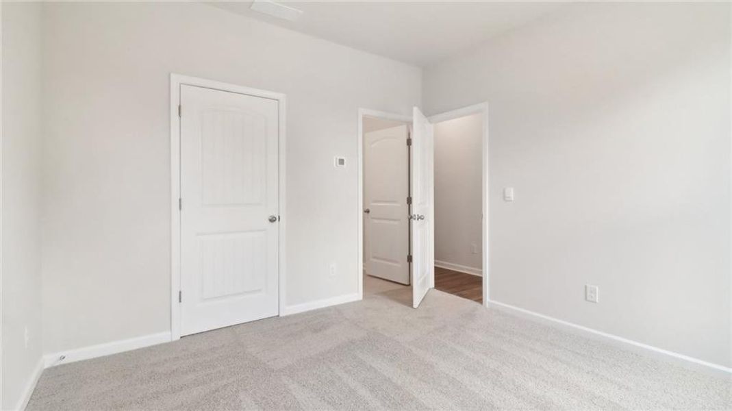 Spacious, unfurnished interior of a new home in Townes at Asbury, Hapeville (Image 24).
