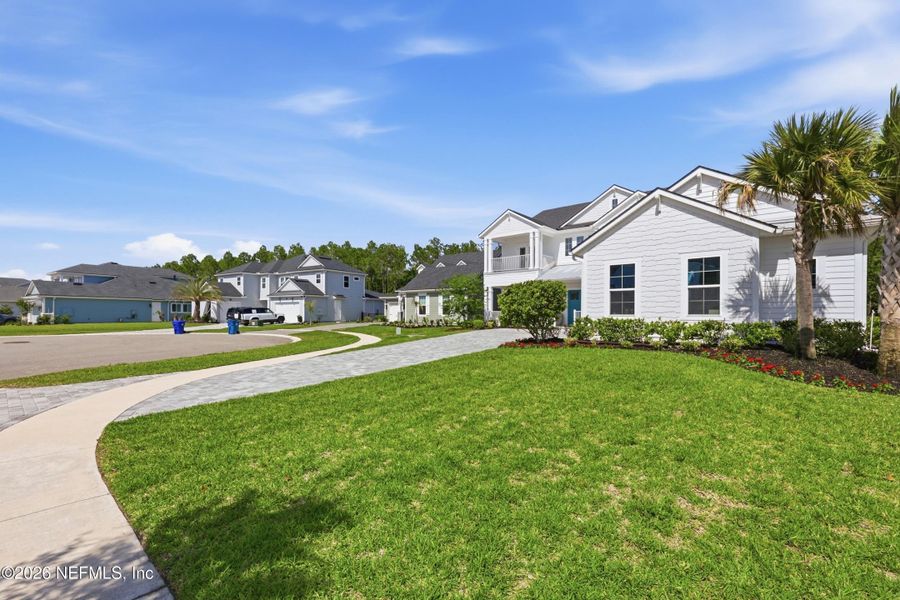 Front exterior of a new home in , Ponte Vedra, FL, highlighting curb appeal (Image 28).